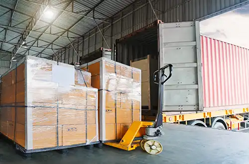 Unloading a drayage container at the warehouse destination