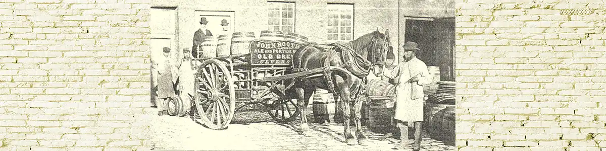 Dray horse and dray cart illustrating the history of drayage