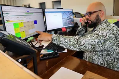 Evans Delivery Dallas team member coordinating container drayage operations